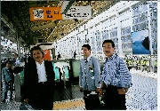 L-R, Movie producer Shuji Abe, guide, Producer Chikara Saito, Kyoto station