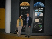Neil and friend Teruyo Uozomi in Mitsubishi pavilion, World Expo, 2005.  See Neil's name on wall behind them.